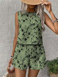 Women's floral print tank top and shorts two-piece set by FitiqueFit, perfect for casual summer wear, with vibrant floral patterns.
