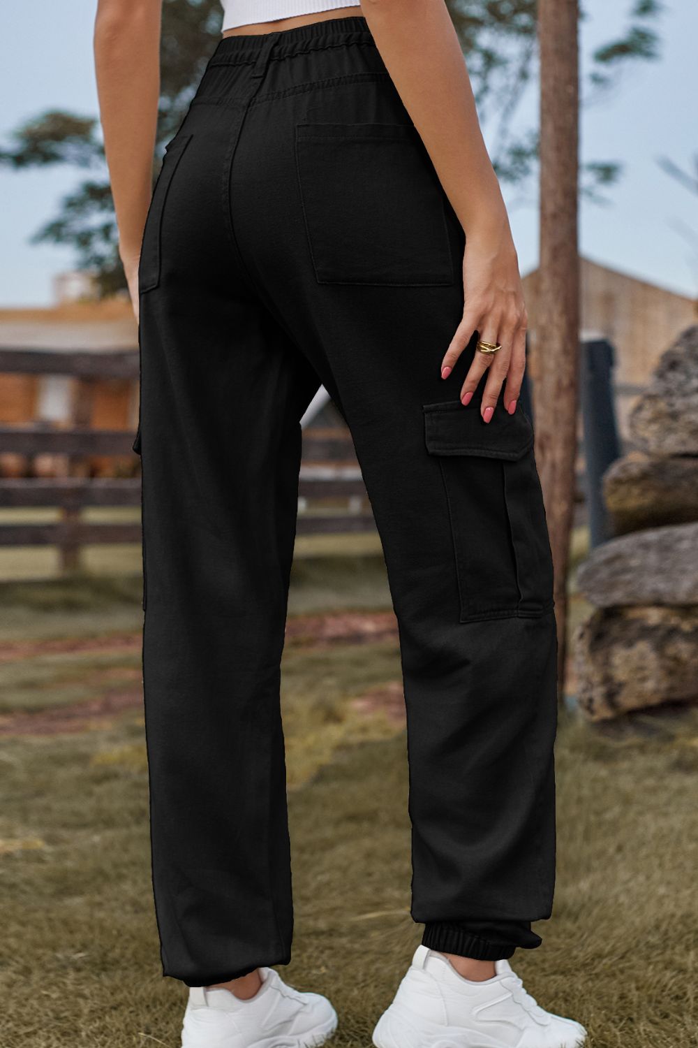 Dark blue Plush Fashion Shop denim jeans with front pockets and straight-leg fit, shown on a model.