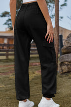 Dark blue Plush Fashion Shop denim jeans with front pockets and straight-leg fit, shown on a model.