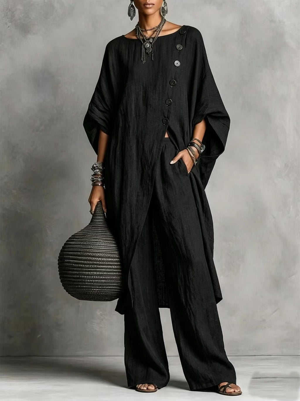 Women's casualwear set featuring a plush fashion hub drop shoulder three-quarter sleeve irregular shirt and matching pants.