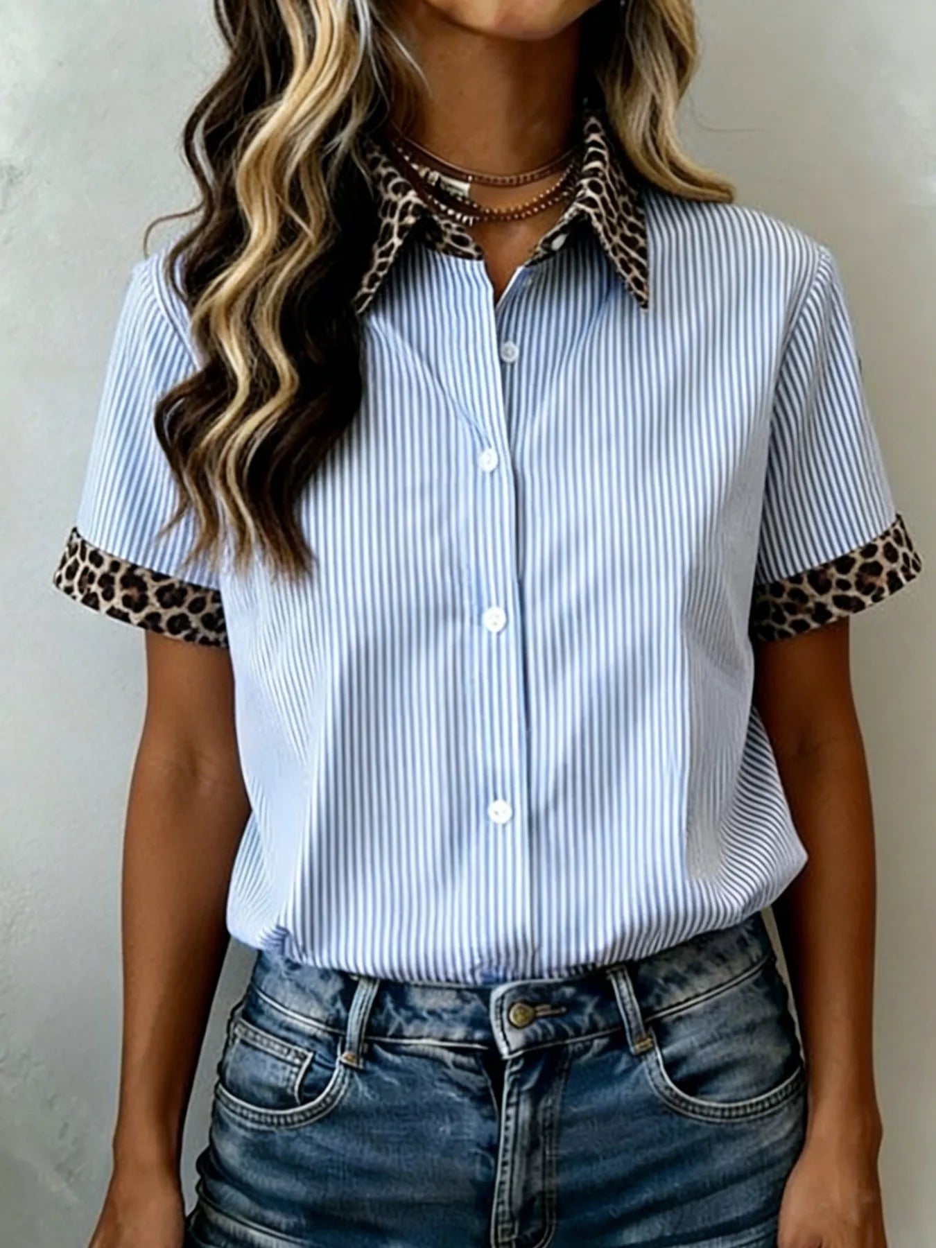 Women's leopard print short sleeve dress with contrast collar by Plush Fashion Hub, stylish and lightweight for casual wear.