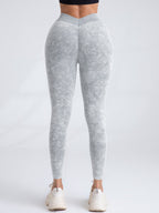 FitiqueFit V-back scrunch butt seamless yoga leggings showing high-waisted design and textured fabric for activewear.