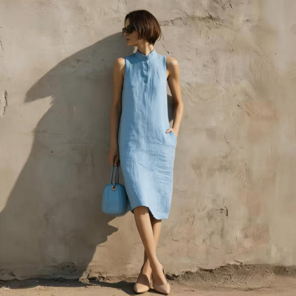 Women's sleeveless A-line midi dress in solid cotton linen fabric, casual style by Plush Fashion Hub.