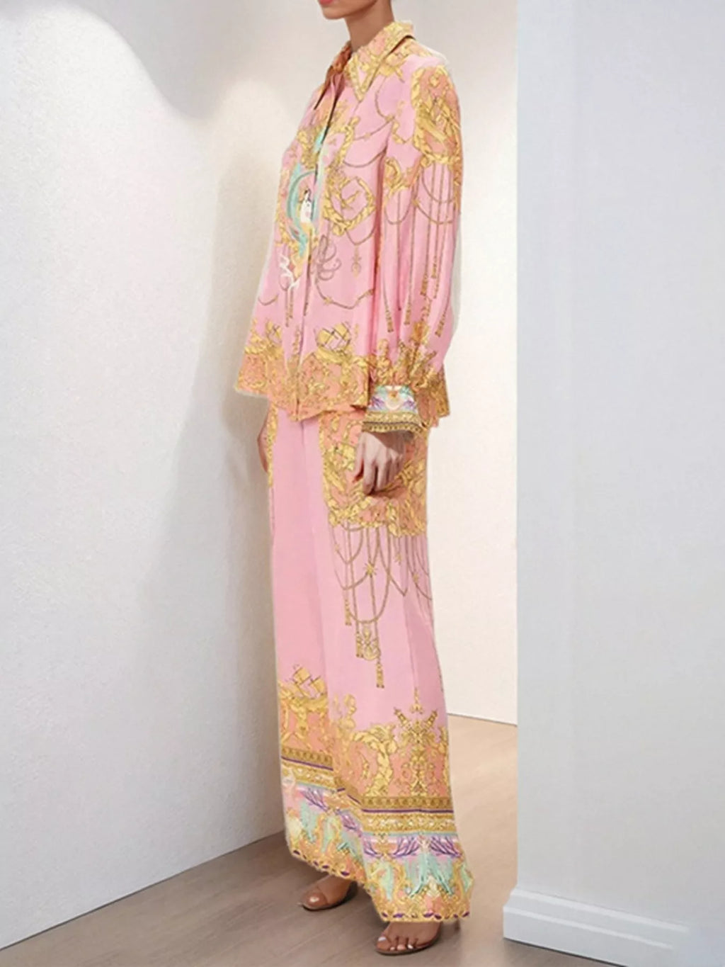 Women's printed lantern sleeve top and matching lounge pants set by Trendsi, comfortable and stylish for casual wear.