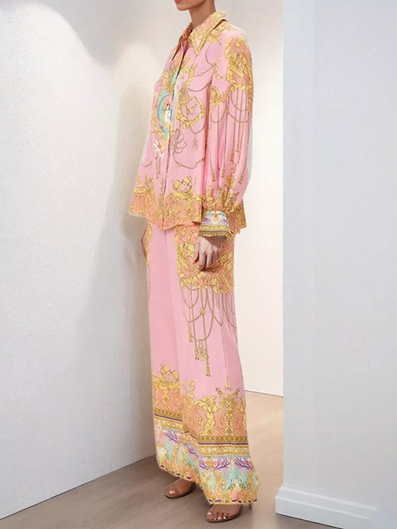 Women's printed lantern sleeve top and matching lounge pants set by Trendsi, comfortable and stylish for casual wear.