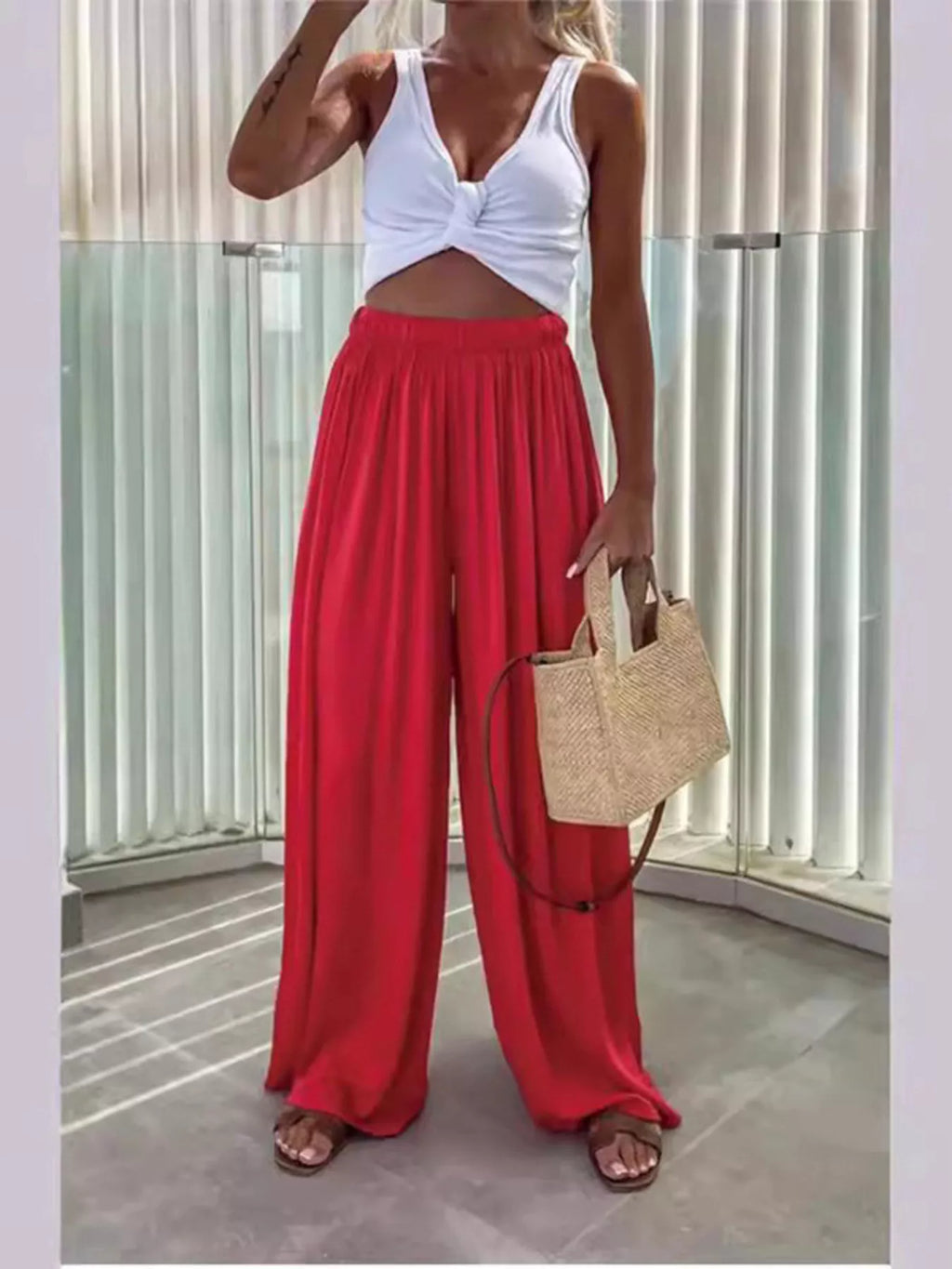 Flowy wide-leg pants from Trendsi, featuring a relaxed fit and lightweight fabric perfect for casual and stylish outfits.