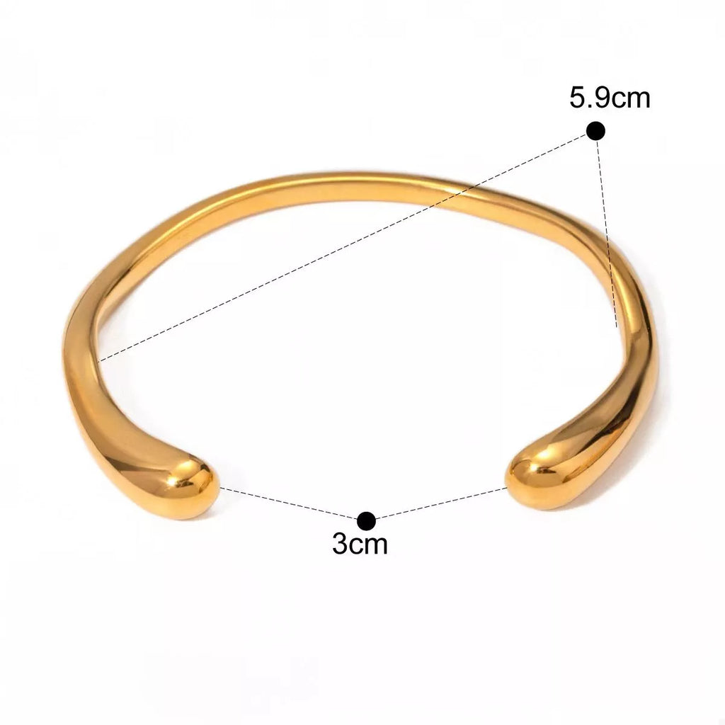 18K gold-plated stainless steel open ring with a sleek, minimalist design, showcasing a shiny finish and smooth curves.