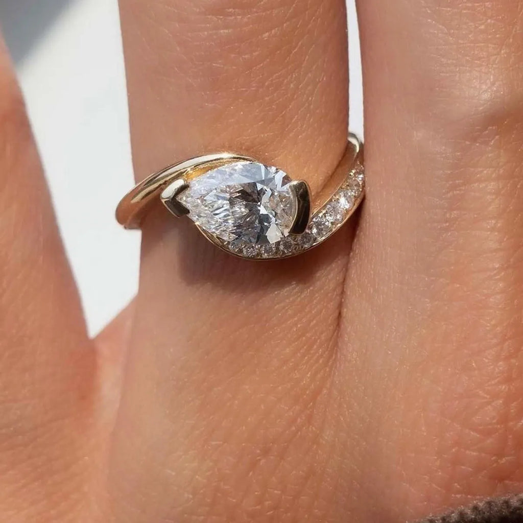 Sterling silver 1.5 carat moissanite ring with a sparkling center stone, crafted by Shopimist.
