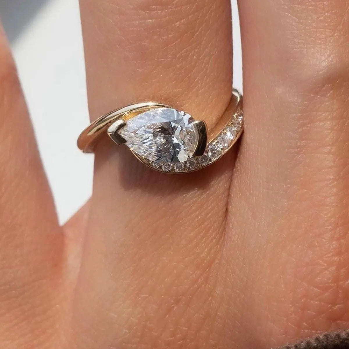 Sterling silver 1.5 carat moissanite ring with a sparkling center stone, crafted by Shopimist.
