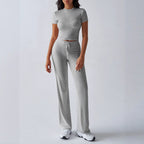 FitiqueFit crew neck short sleeve top and full-length pants two-piece set in solid color, available in 10 colors, casual style.