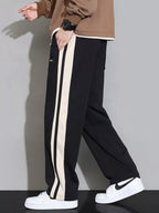 Men's plus size casual loose pants with side stripes, Shopimist brand, featuring a relaxed fit and striped design.