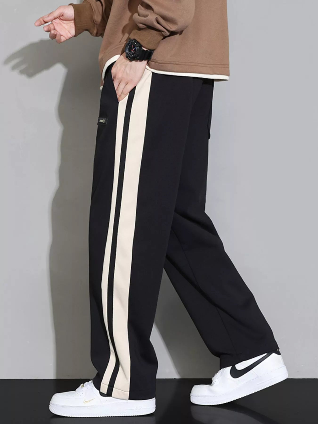 Men's plus size casual loose pants with side stripes, Shopimist brand, featuring a relaxed fit and striped design.