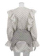 Shopimist ruffled floral print mini dress with feminine design, featuring a flowy silhouette and vibrant flower pattern.