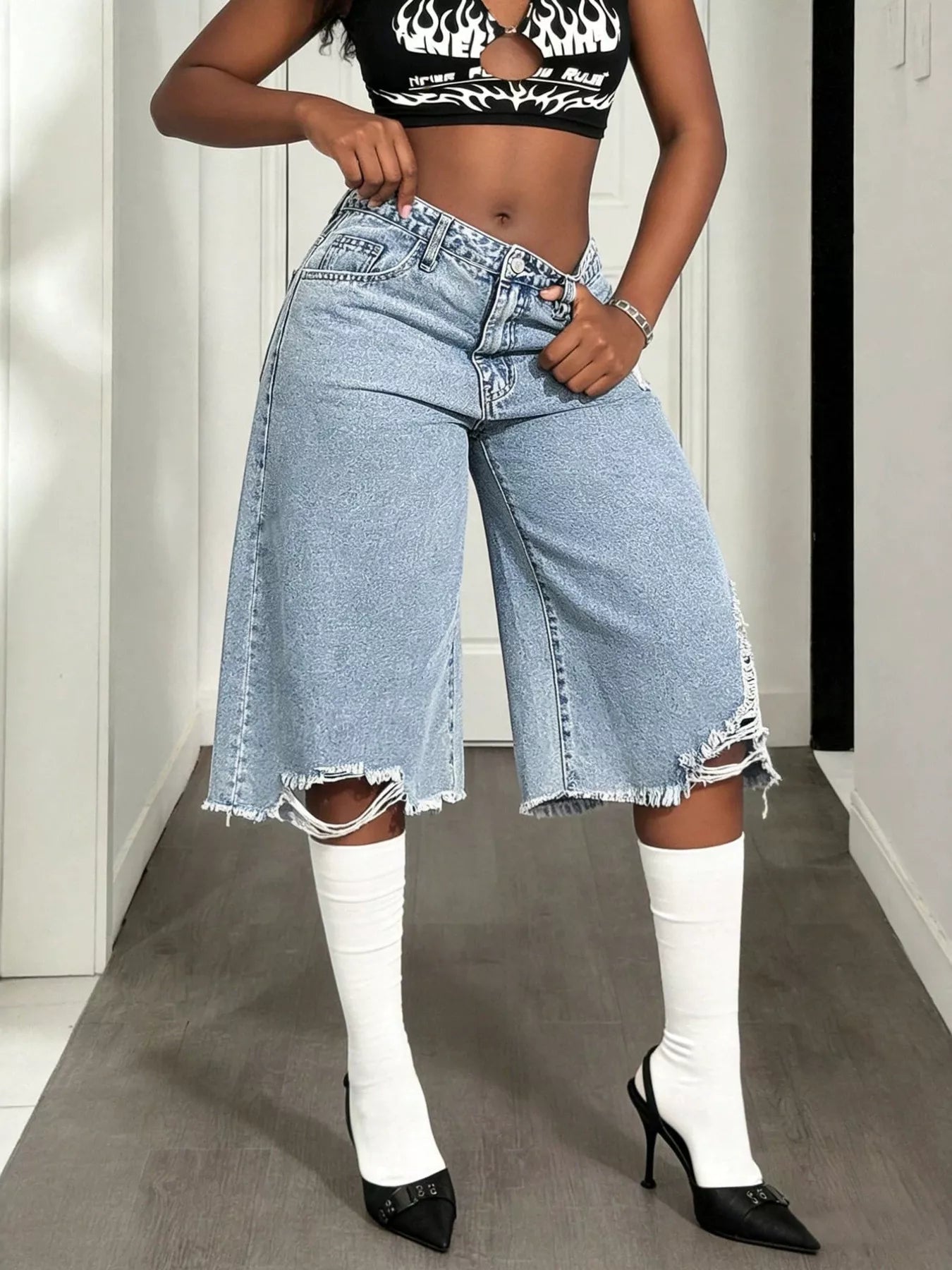 Plush Fashion Hub distressed wide-leg denim shorts with frayed edges and casual fit, displayed on a neutral background.