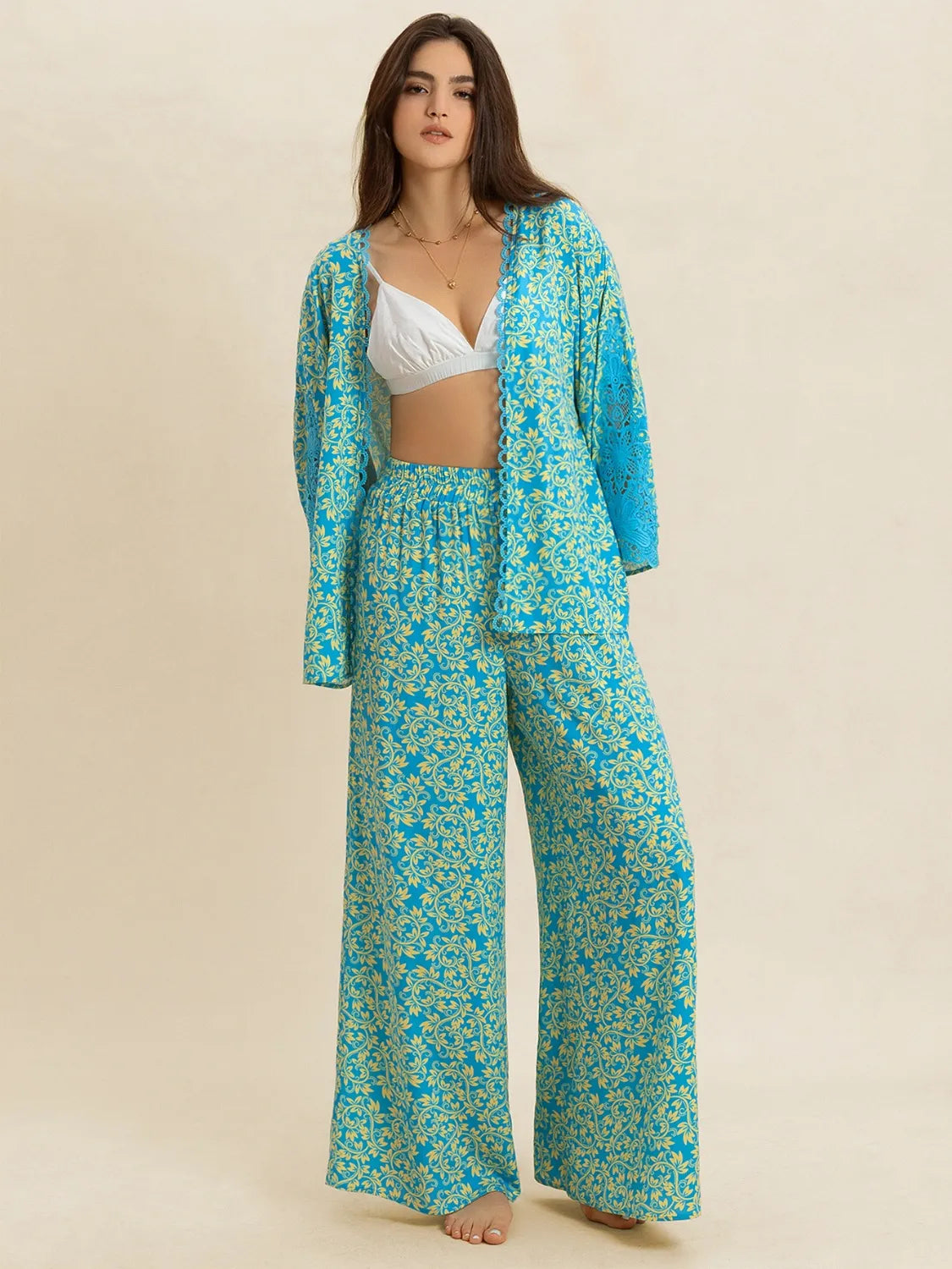 Open front printed matching top and pants set by Plush Fashion Hub, featuring a stylish coordinated outfit with bold print.