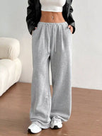 Simply Love casual drawstring high waist wide-leg sweatpants displayed on a model, featuring a relaxed fit and comfortable fabric.