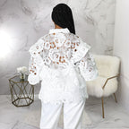 Women’s Bella Mia hollow-out cutout cardigan with lantern sleeves, flounce trim, lace-up front, and stylish design.