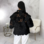 Women’s Bella Mia lace-up cardigan with hollow out cutouts, flounce trim, and lantern sleeves, stylish and lightweight.
