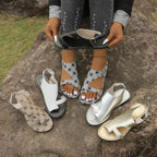 Shopimist Toe Loop Flats Sandals featuring minimalist design and comfortable straps on a neutral background.