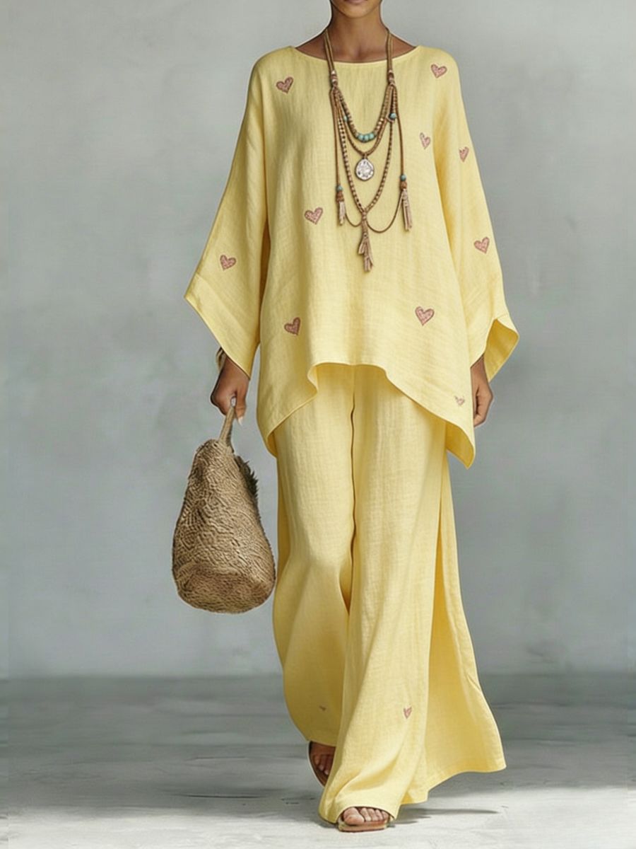 Floral print bamboo linen two-piece set with wide-leg pants by FitiqueFit, featuring a matching top and relaxed-fit trousers.