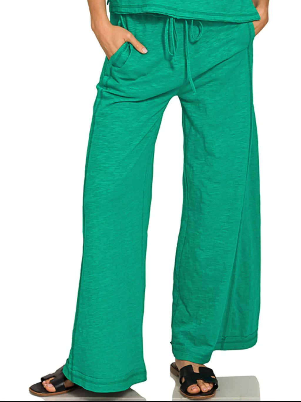 Women's cotton slub loungewear set with short sleeve tee and pants from Trendsi, soft and comfortable for relaxing wear.