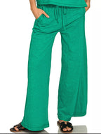 Women's cotton slub loungewear set with short sleeve tee and pants from Trendsi, soft and comfortable for relaxing wear.