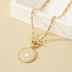 Chain link necklace by Shopimist featuring a vintage coin pendant, detailed close-up of the pendant and chain links.