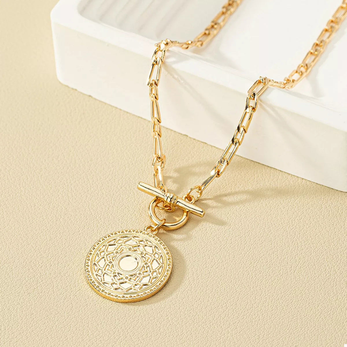 Vintage coin pendant chain link necklace featuring a classic coin charm, stylish jewelry piece by Plush Fashion Hub