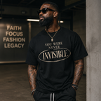 Wear Your Worship You Were Never Invisible T-Shirt with inspirational statement text in black on a casual cotton tee.