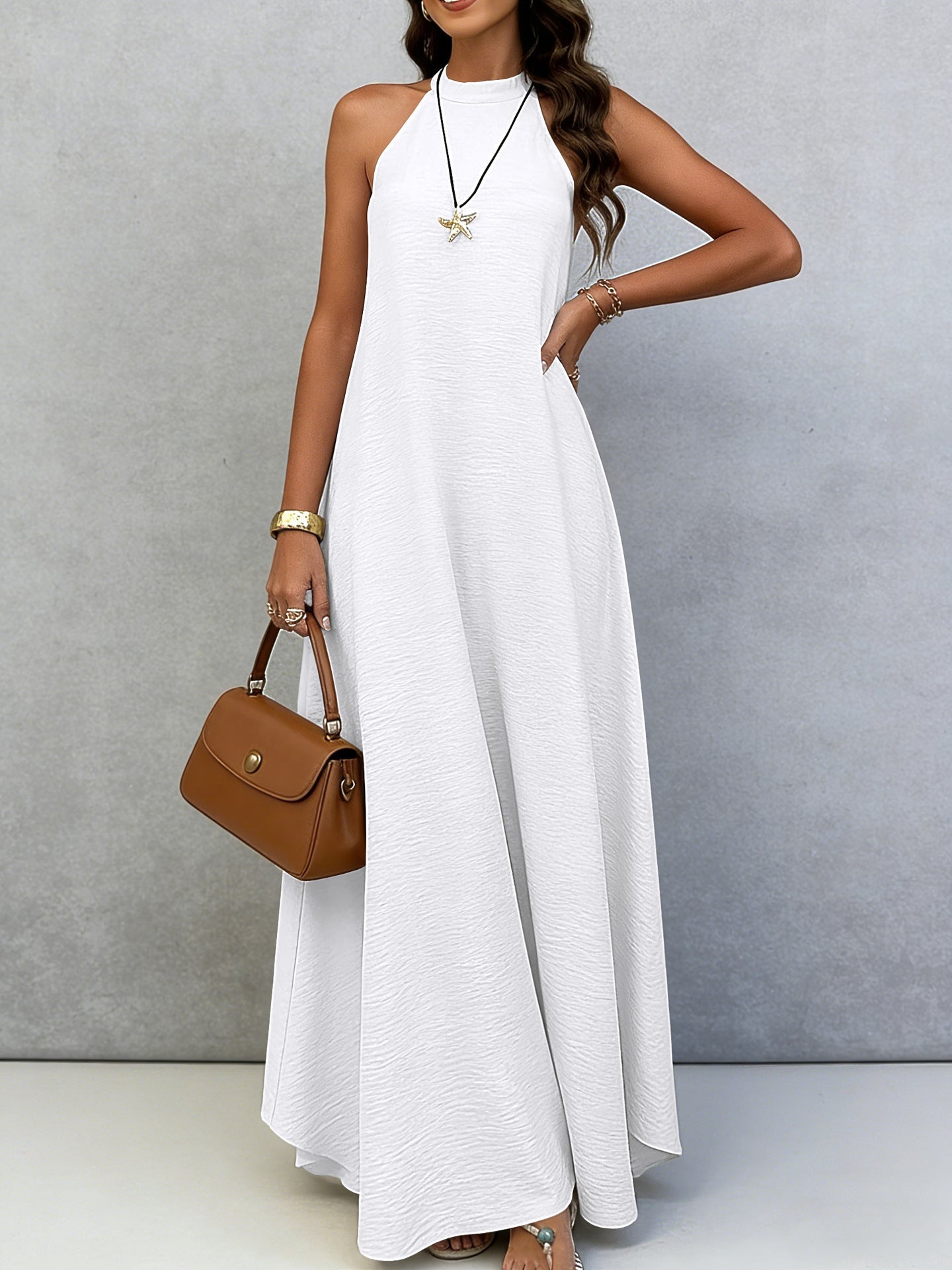 Women's ice silk crinkle sleeveless swing maxi dress by Plush Fashion Hub, casualwear with flowing silhouette and lightweight fabric.