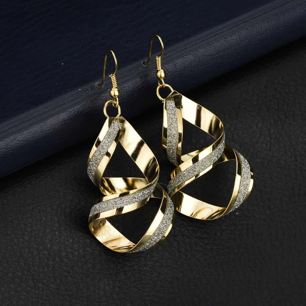 Fashion trendy earrings and ear studs from Trendy Attic Store01, featuring stylish metallic designs and versatile wear.