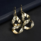Fashion trendy earrings and ear studs from Trendy Attic Store01, featuring stylish metallic designs and versatile wear.