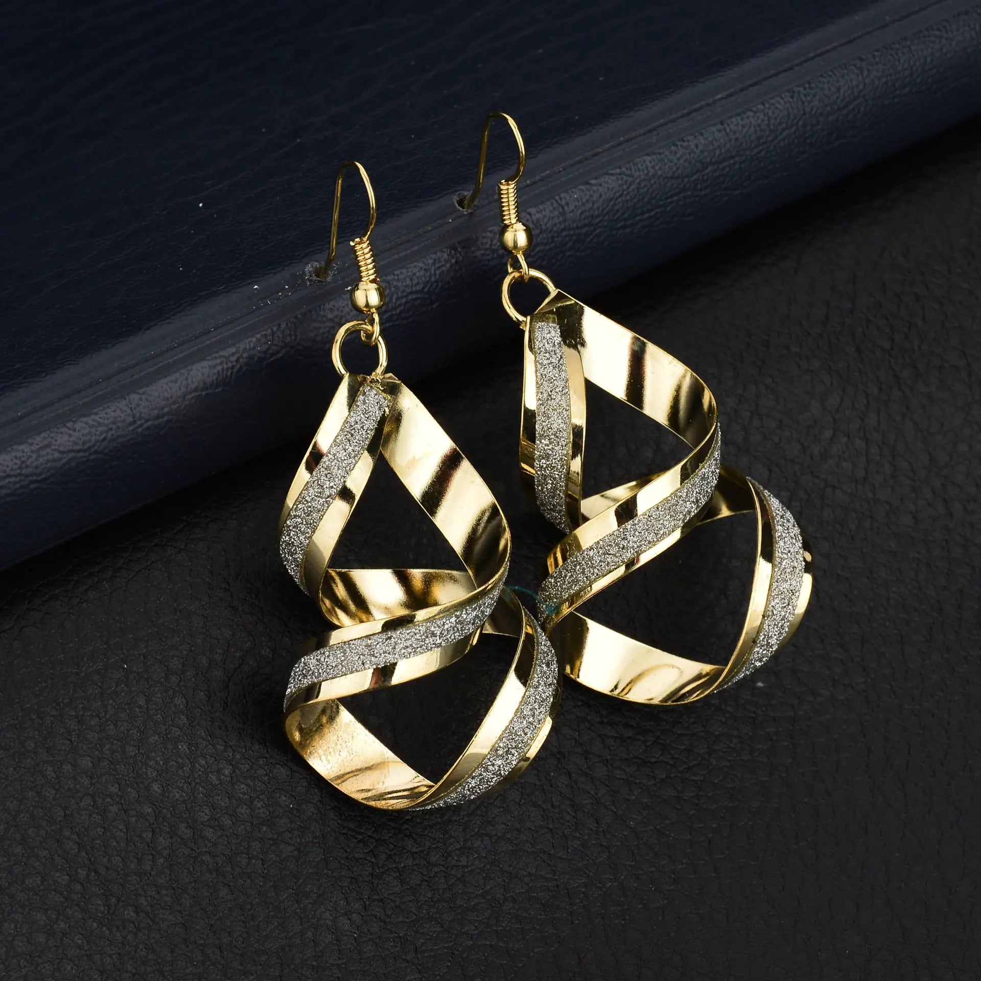 Fashion trendy earrings and ear studs from Trendy Attic Store01, featuring stylish metallic designs and versatile wear.