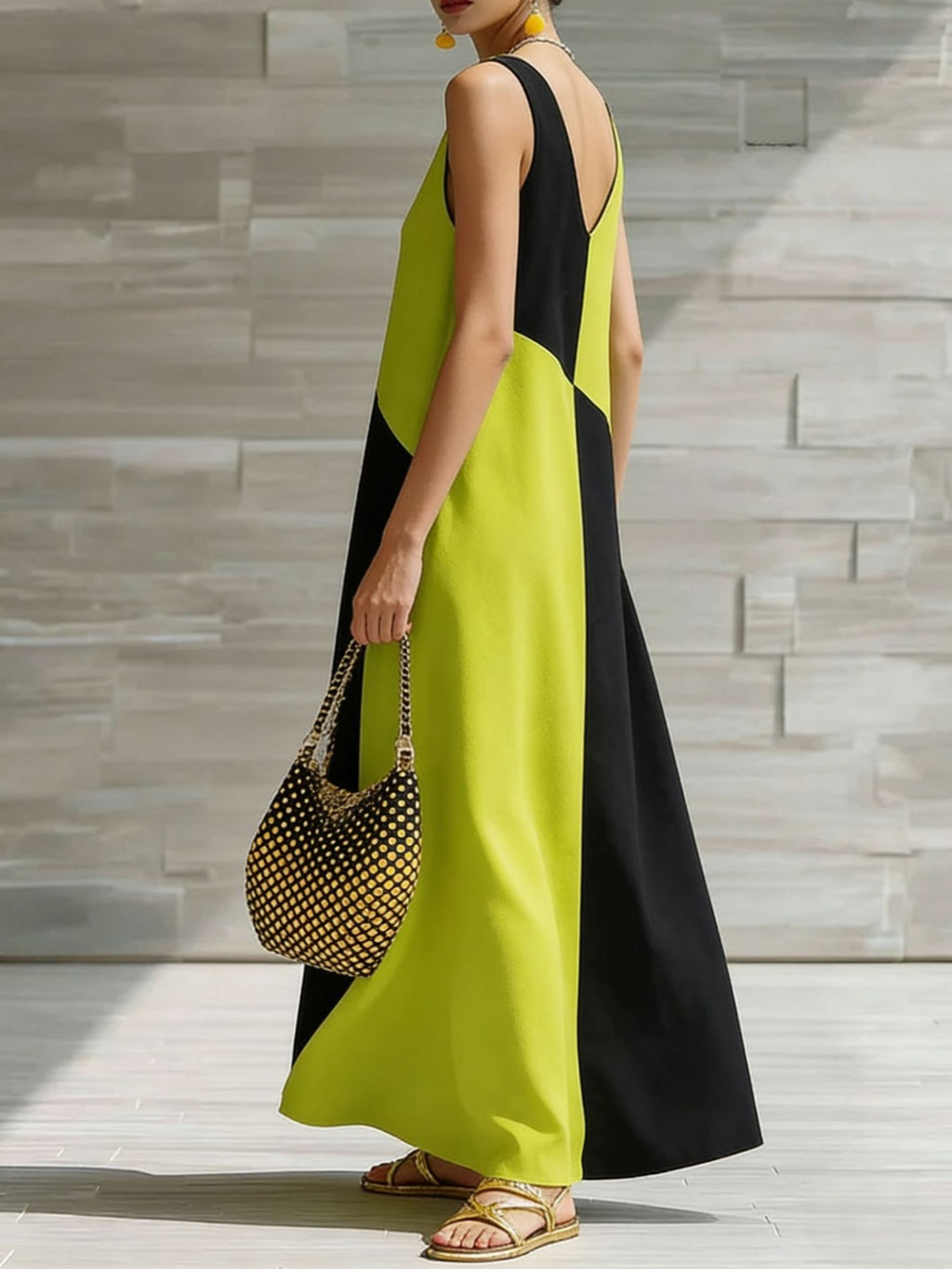 Women's chic color block sleeveless maxi dress by Trendsi, lightweight summer fashion with a stylish color block design.