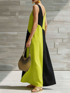 Women's chic color block sleeveless maxi dress by Trendsi, lightweight summer fashion with a stylish color block design.