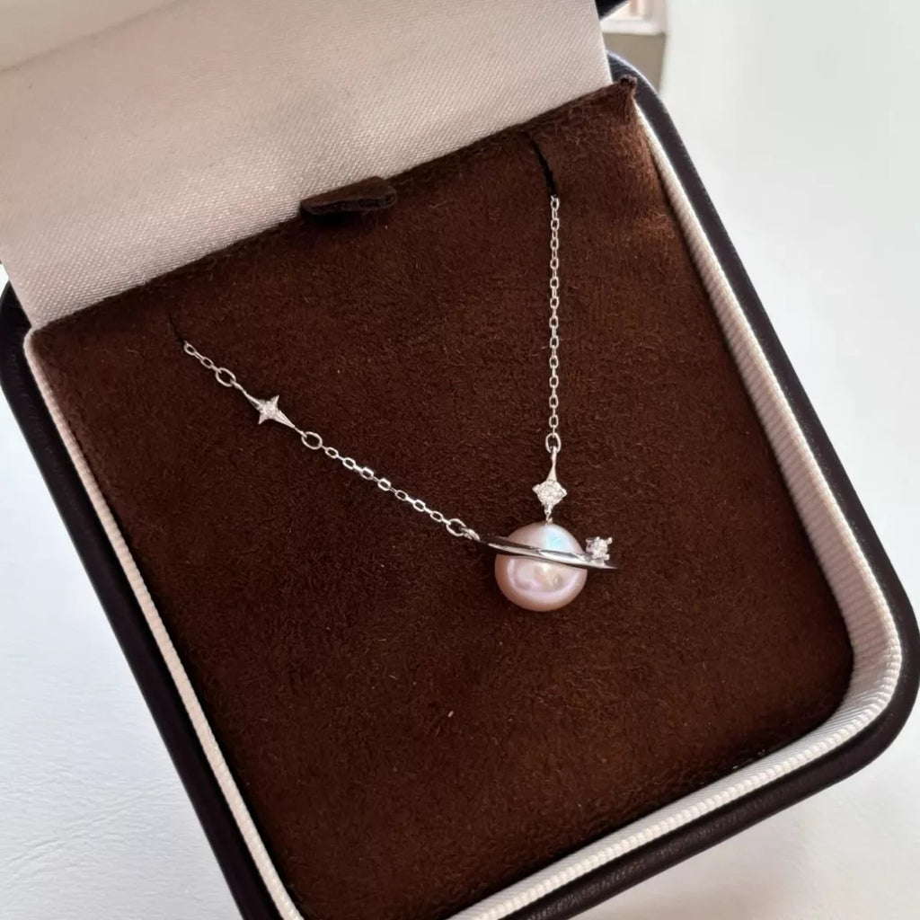 Shopimist Planet Pearl Pendant Necklace featuring a luminous pearl charm on a delicate chain.