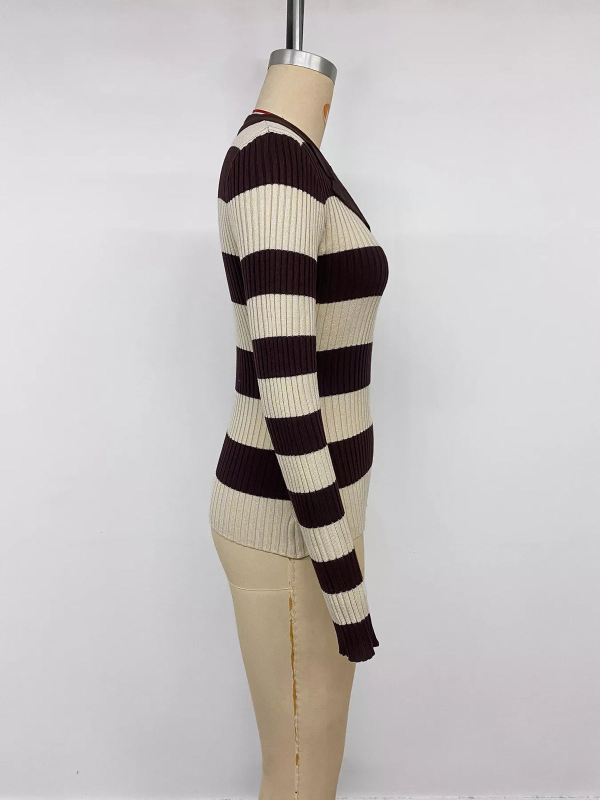 Striped ribbed knit long sleeve sweater shirt by Plush Fashion Hub, featuring a fitted design and bold stripe pattern.