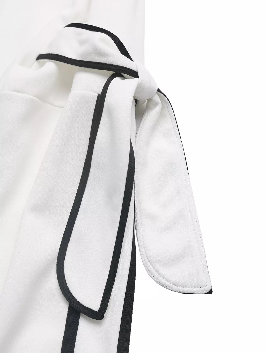 Black and white striped round neck sweatshirt from Trendsi, casual long-sleeve top with side stripe details.