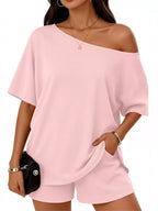 Plus size one shoulder top and shorts set by Plush Fashion Hub, featuring a stylish, coordinated casual outfit.