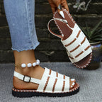Open toe buckle sandals by Shopimist featuring stylish straps and a comfortable flat sole, perfect for casual summer wear.
