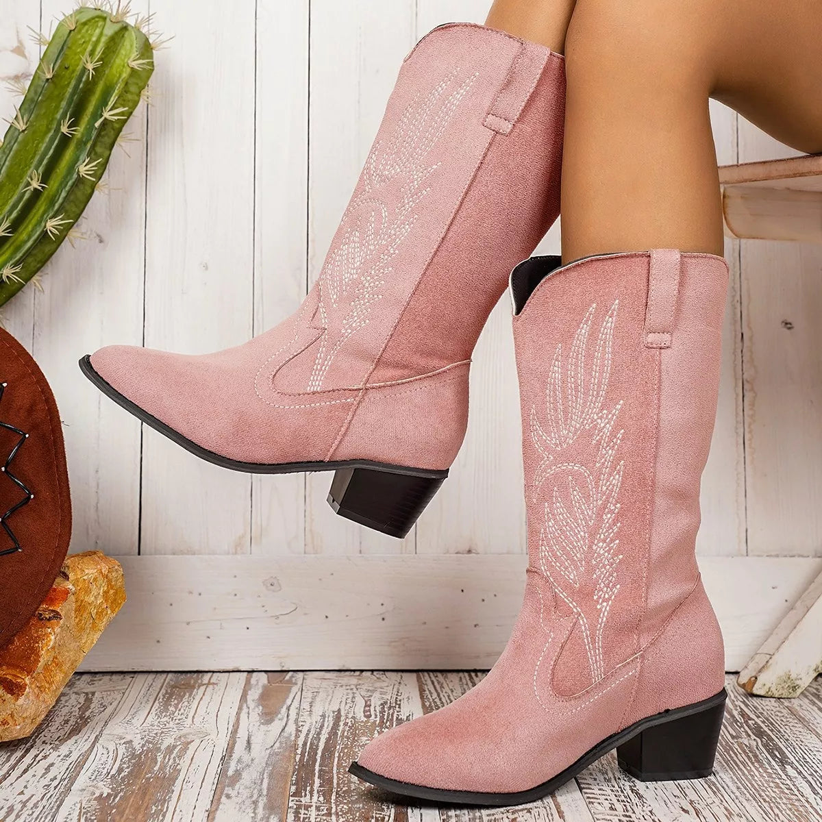 Point toe block heel boots from Trendsi featuring sleek design and sturdy heels, perfect for stylish fall and winter outfits.