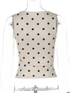 Polka dot tank top by Shopimist featuring a sleeveless design with black and white polka dots on soft fabric