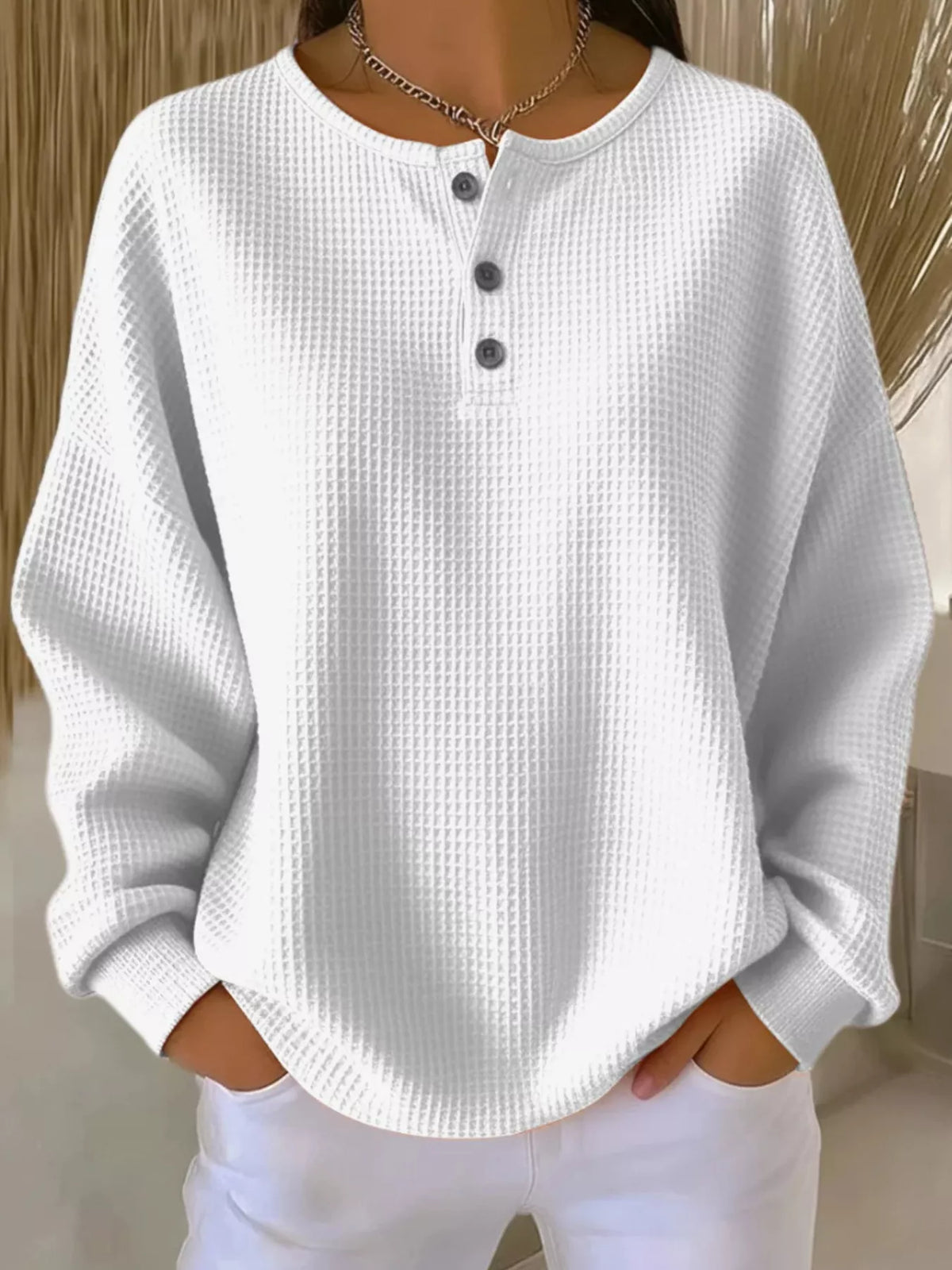 Plus size waffle knit top with button details from Trendsi, featuring a cozy textured fabric and relaxed fit.