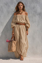 Women's sleeveless cotton-linen maxi dress with boat neck in a relaxed fit, stylish and comfortable for warm weather.