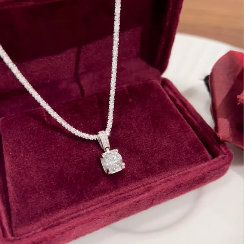 Sterling silver moissanite necklace with 1 carat center stone, elegant jewelry piece from Shopimist.