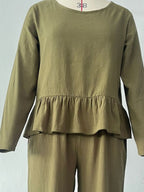 Women's ruffled hem long sleeve top and pants lounge set with pockets, stylish 2-piece set by Trendsi.