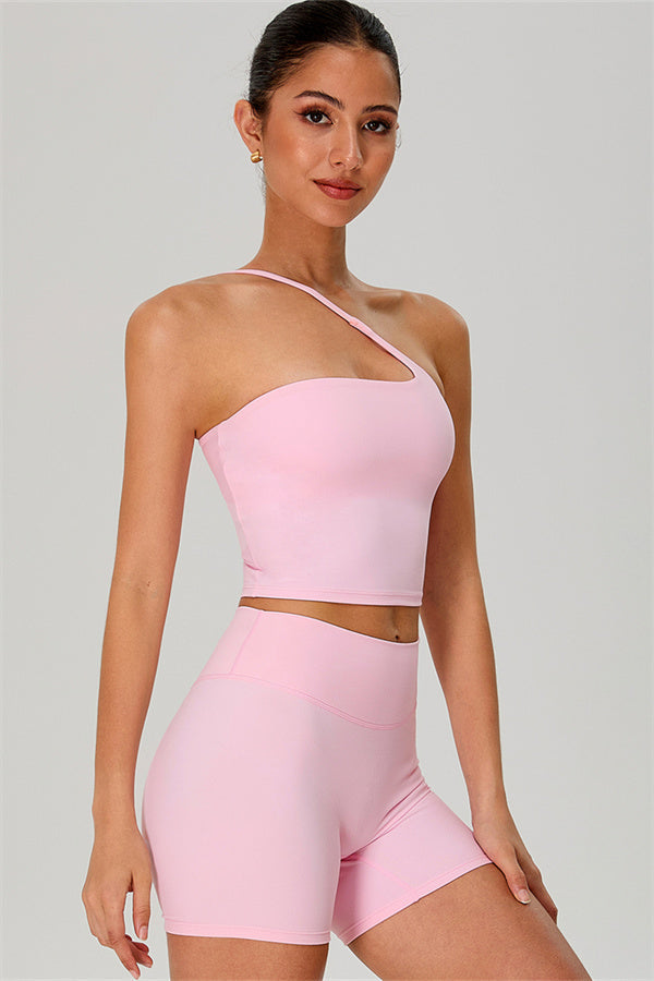Fitglutes activewear one-shoulder crop top and shorts 2-piece set for workout, featuring stylish sportswear design.