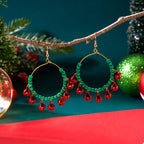Shopimist Christmas beaded hoop earrings with jingle bells, featuring festive beads and small bells for holiday cheer.