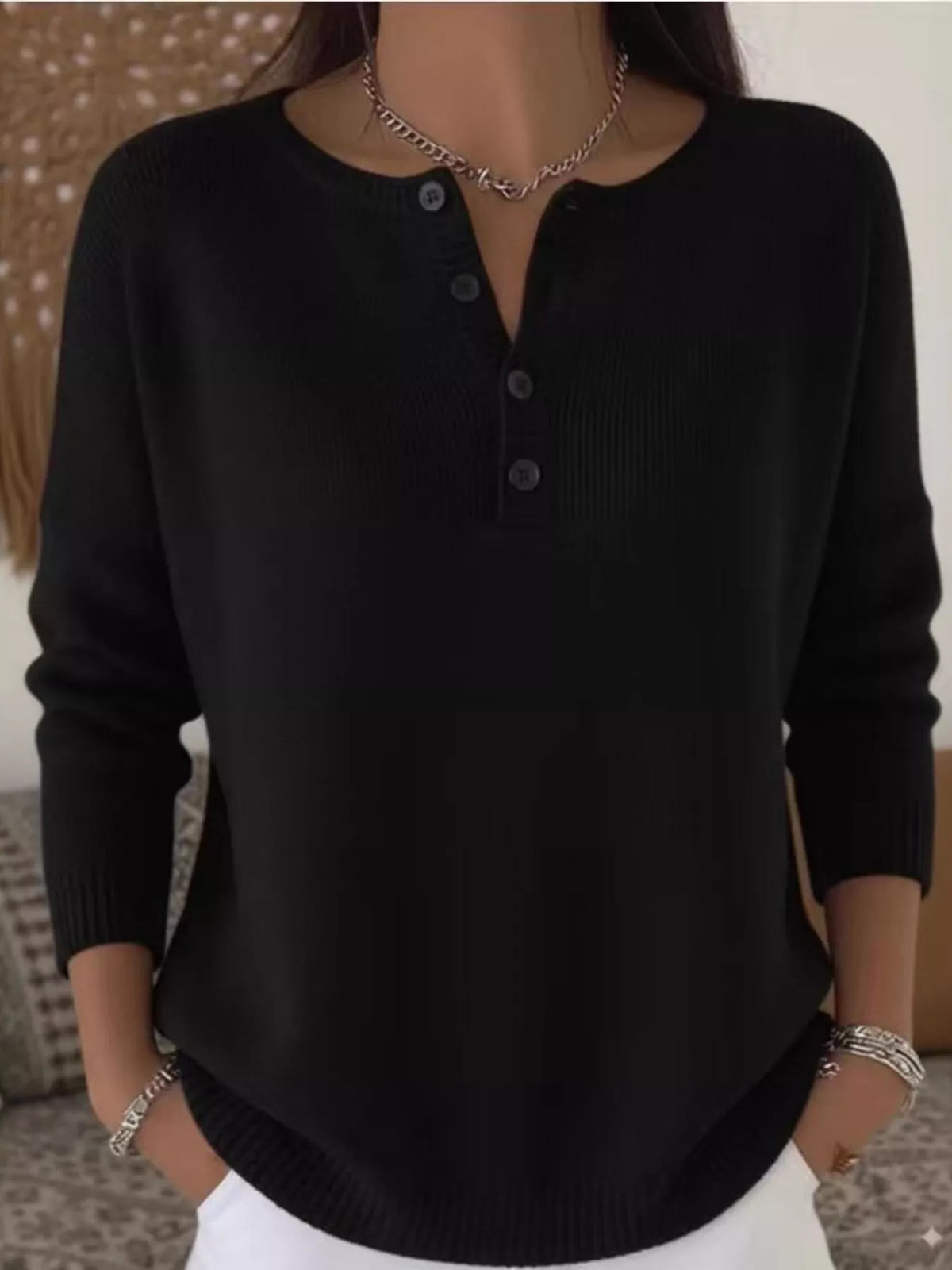 Plus size ribbed knit sweater with button details by Trendsi, featuring a full size fit and cozy, textured fabric.