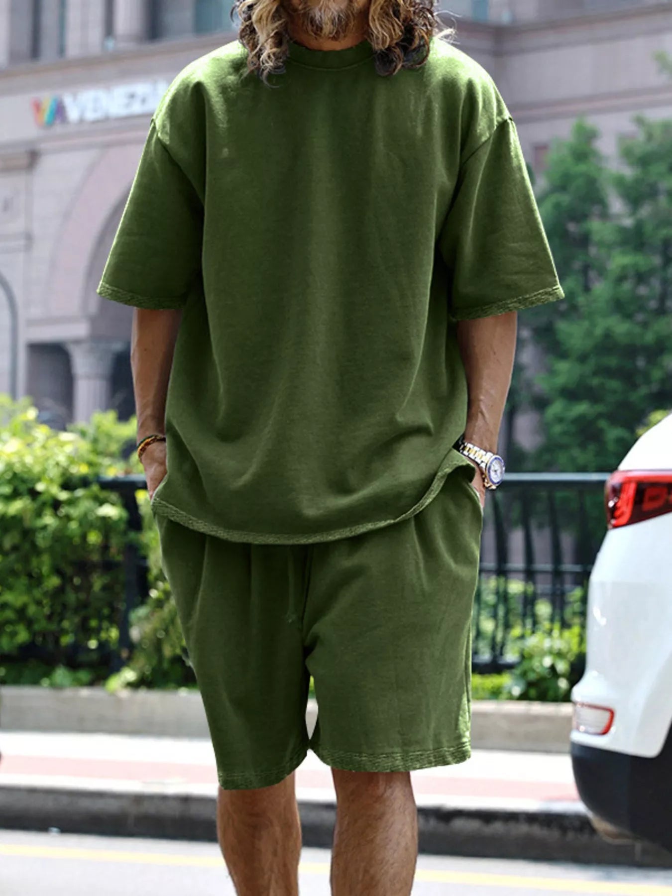 Men's relaxed fit T-shirt and shorts set in plus size, casual men's tops by Trendsi, featuring a comfortable, relaxed style.